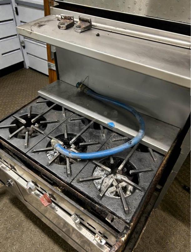 Jade 36" commercial gas range and oven, model JAD-L-RNG-0193, in immaculate condition; natural gas, tested and working.