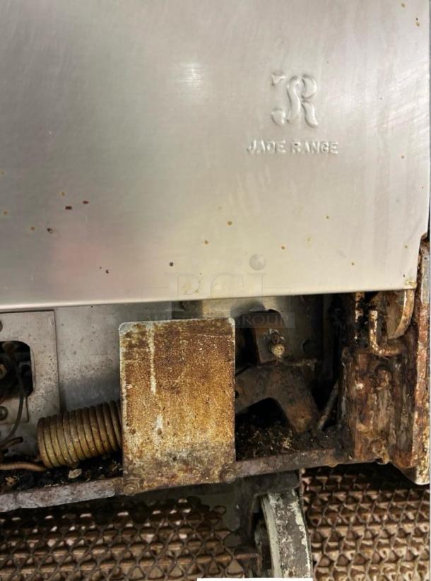 Jade Range 36" commercial gas range with visible logo, showing some signs of wear. Fully tested and functional.