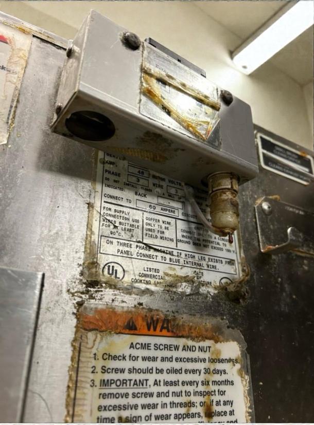 BKI FKM-F Commercial Pressure Fryer, 208V/3-Phase, tested working. Features manufacturer labels and usage instruction plates.