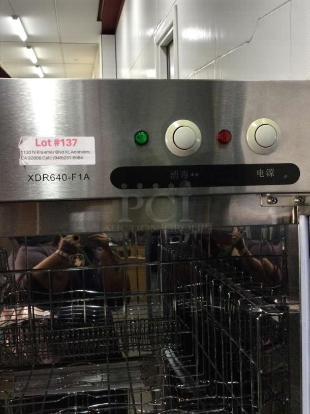 Commercial XDR640-F1A stainless steel sterilizer cabinet in superior condition. Features control buttons, label with model and lot number. Fully tested.