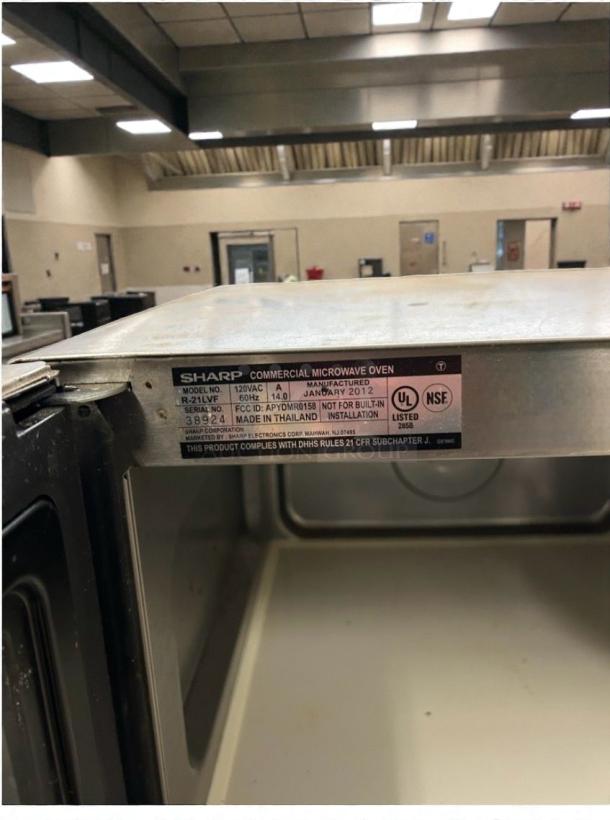 Sharp R-21LVF Commercial Microwave Oven, 120V, excellent condition, fully tested. Label shows UL and NSF certified. Made in Thailand.