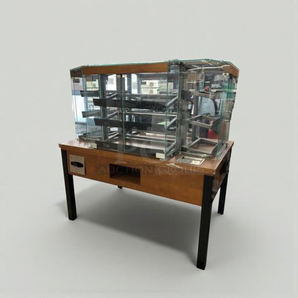 5FT Four-Way Dry Pastry Merchandiser by Commercial Display Equipment. Excellent condition, glass panels, wood frame, 60x39x63in. Fully inspected, model BAK-L-DSP-0213.
