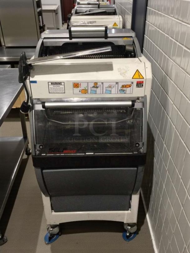 JAC KG-12FS commercial bread slicer, refined condition, 115V, single phase, fully tested, with operational instructions.