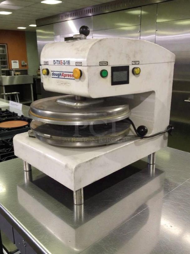 Immaculate DoughXpress D-TXE-2-18 dough press, 208-240V, single phase, tested, white, commercial use, model label visible.