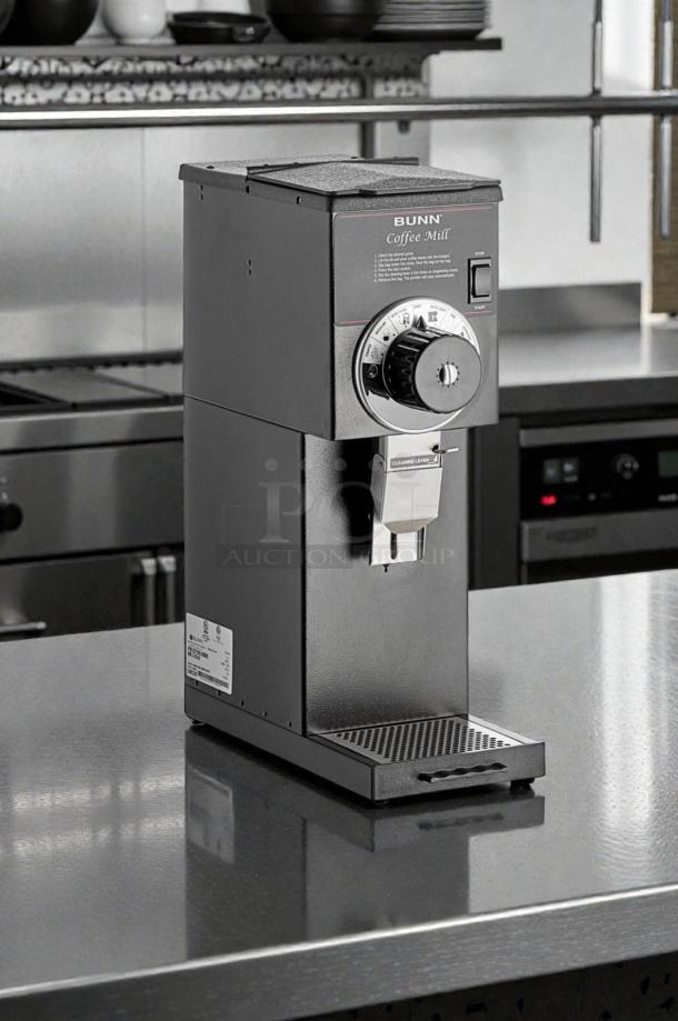 BUNN G1 commercial coffee grinder in pristine condition, 120V, fully tested. Features adjustable grind settings.
