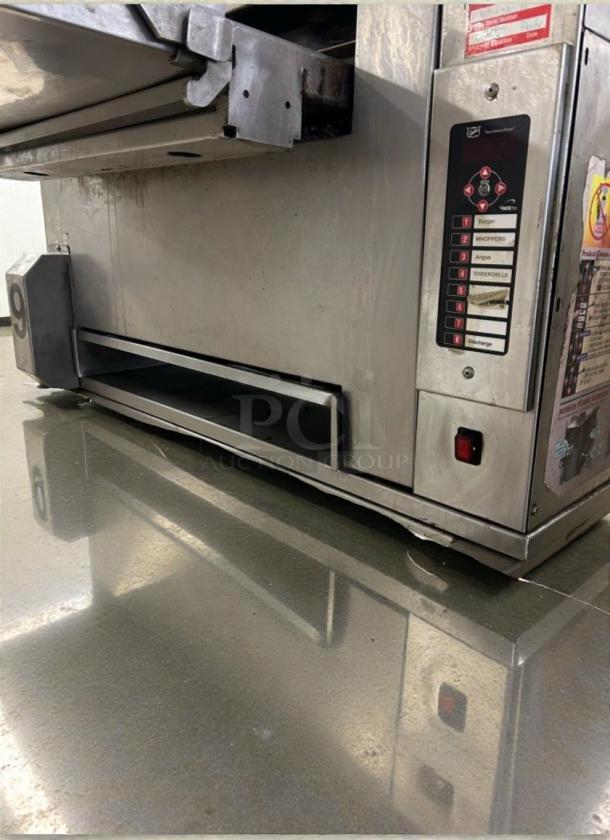 Premium Duke Commercial Conveyor Broiler, model DUK-L-BRL-0227, natural gas, tested, good condition, features control panel.