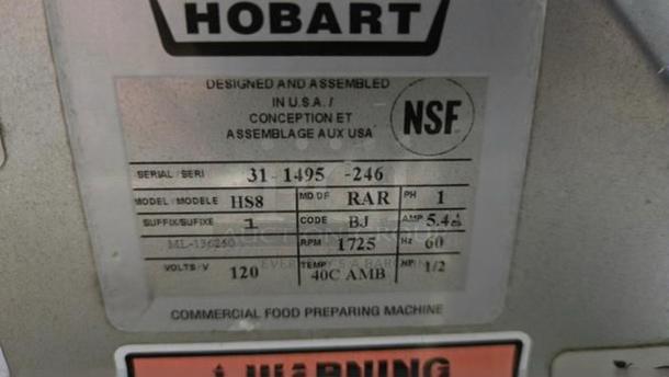Hobart HS8 meat slicer label showing model, serial number, 120V, single phase, NSF mark, and commercial use indication.
