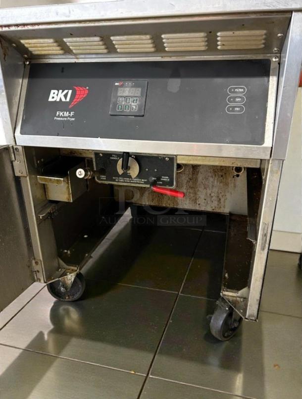 BKI FKM-F 75 lb electric pressure fryer, 208V/3 phase, fully tested, excellent condition, with control panel and branding visible.