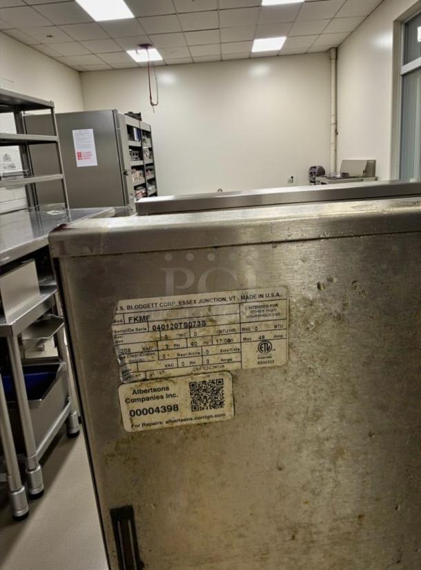 BKI FKM-F 75 lb commercial electric pressure fryer, 208V, 3-phase. Fully tested, top-tier condition. Tags detail specs and model.