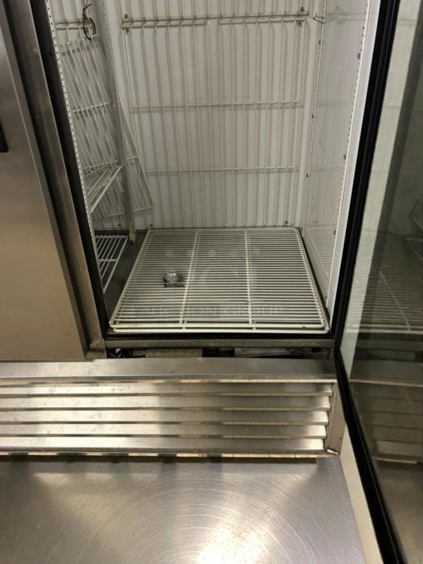 True T-49F commercial reach-in freezer, excellent condition, fully tested, 115V/Single Phase. Clean interior shelves visible.