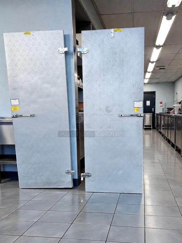 Immaculate Nor-Lake walk-in cooler/freezer doors, quantity 2, inspected, Hudson-made, ready for installation.