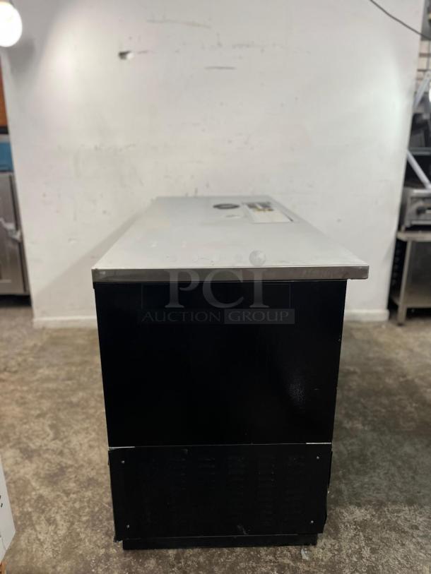 Micro Matic MDD68-E-LT 69" Draft Beer Cooler, two-section, black exterior, commercial use. Slight wear visible.