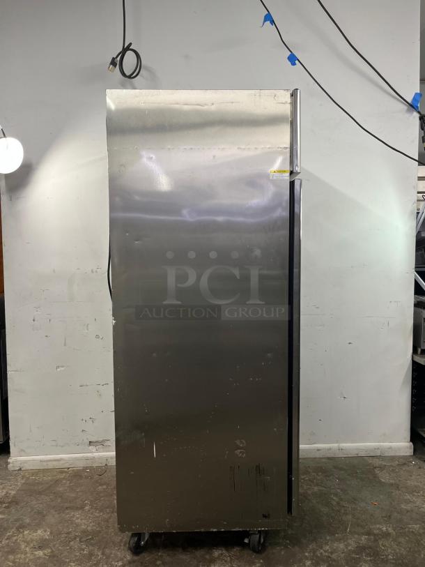 EVEREST ESF1 commercial-grade one-section reach-in freezer in good condition, stainless steel finish, on casters.