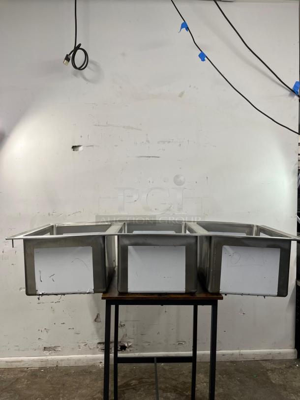 BRAND NEW Regency 16-gauge stainless steel three compartment drop-in sink, model 600DI31612.