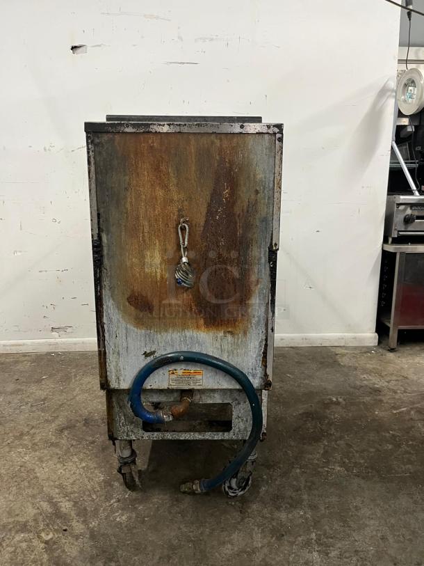 Pitco SG14-S gas fryer, commercial model with 40-50 lb. oil capacity, 110,000 BTU output, visible rust, and wear.