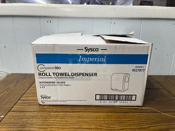SYSCO Imperial Complete 360 Automated Roll Towel Dispenser, Model 4527877, black, new in box with reorder number 4527877.