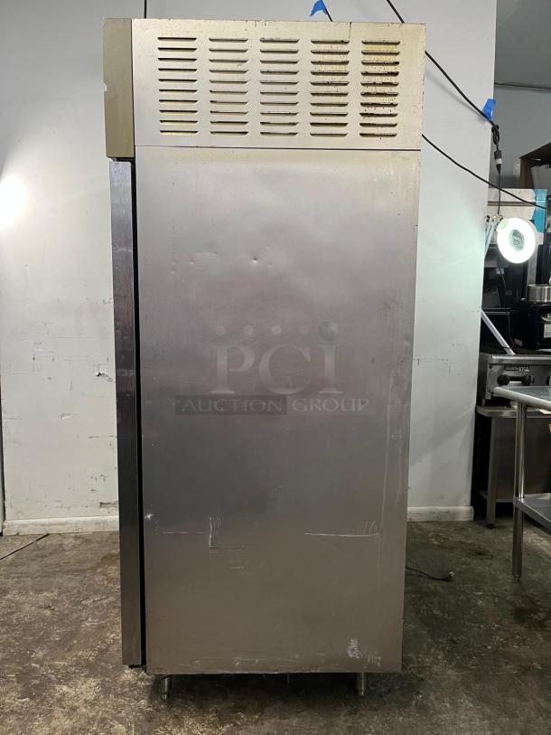 Green World GST-40DR commercial refrigerator, 2 solid doors, Turbo Air, stainless steel, visible wear, model tag present.