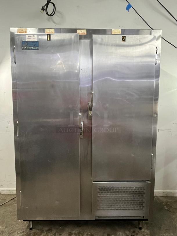 GLENCO 2-door commercial freezer, model SLA-28-S, stainless steel, visible wear, functional condition, equipment label present.