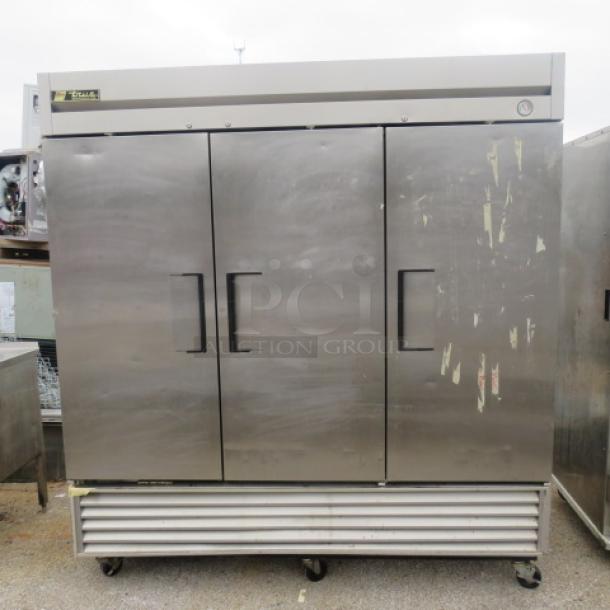 True T-72 three-door refrigerator on casters, 12 racks, stainless steel, 78x30x84 inches, 115V, used condition.