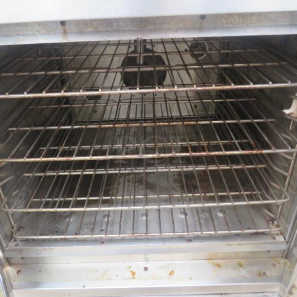 American Range convection oven interior with wire racks, Model M-2-G1, used condition, natural gas, 40x30x72.5 inches.