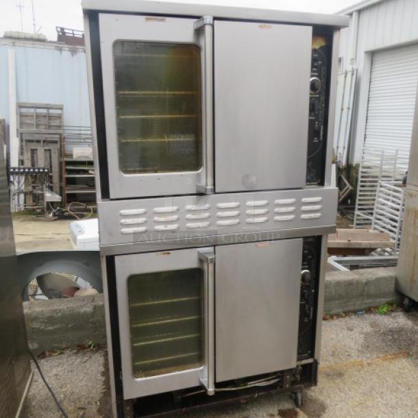 Southbend natural gas double stack convection oven, 8 racks, on casters, stainless steel, 40x39x72.5 inches, used condition.