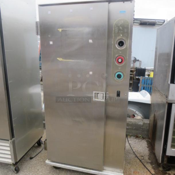Plate Mate HM84-W1 heated holding cabinet, on casters, stainless steel, 36x30x76 inches, 120V, used condition.