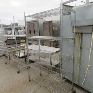Metro shelving unit with five adjustable wire shelves on casters, dimensions 48x18x76 inches, in good condition.