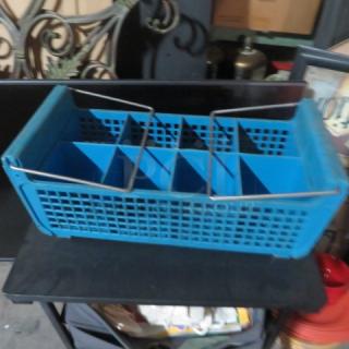 Blue plastic flatware dishrack with metal handles, featuring multiple compartments for utensil organization. Good condition.