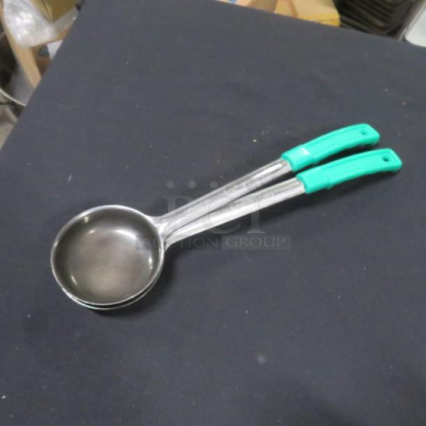4oz stainless steel spoodle with green plastic handle; features include durable construction; branded "2XBID."