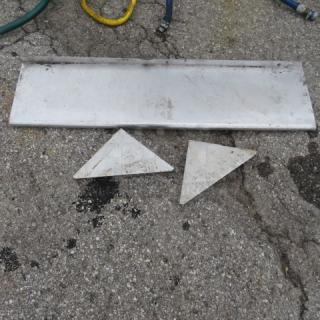 Stainless steel wall mount shelf with brackets, 48x12x12 inches, moderate wear, suitable for kitchen or garage use.