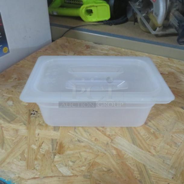 1/4 Size 4 Inch Deep Food Storage Container with Lid, translucent plastic, good condition, 2XBID marking visible.