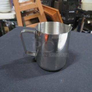 New 12oz stainless steel frothing pitcher with handle, shiny finish, ideal for milk frothing and steaming.