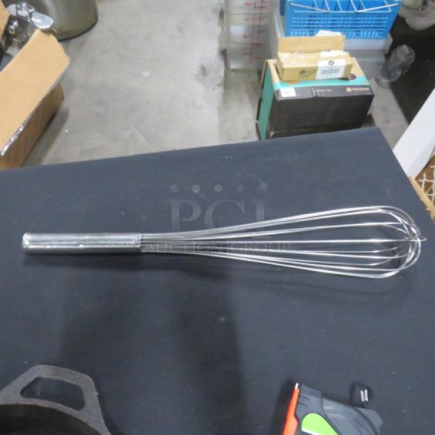 18-inch stainless steel whip with a polished finish, good condition, suitable for mixing and whisking.