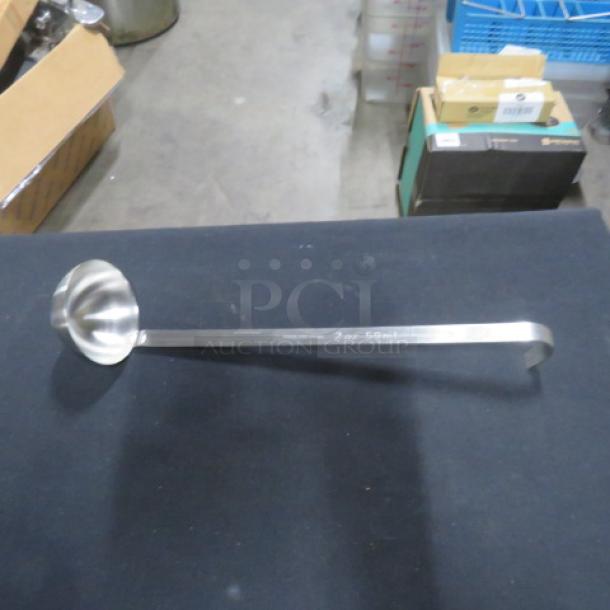 NEW 2oz stainless steel ladle, long handle, engraved with "2oz-60ml." Mint condition, ideal for precise serving.