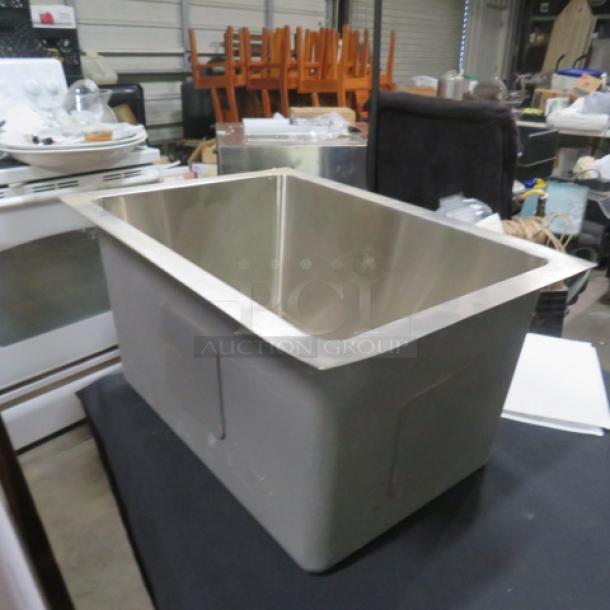 New stainless steel drop-in sink, 12x17x9 inches, pristine condition.
