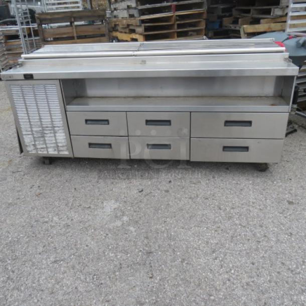 Delfield 6 Drawer Refrigerated Prep Table, Model F18SC85, on casters. 83x31x38 inches, 115 Volt, stainless steel.