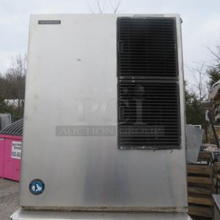 Hoshizaki KM-901MAH ice maker in used condition. Features stainless steel body, 208/230V, 1 phase. Model and brand labels visible.