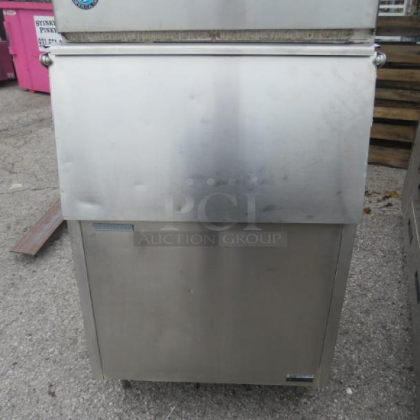 Hoshizaki ice bin, stainless steel, used condition, visible wear. Features front access door and exterior label.