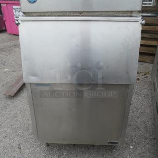 Hoshizaki ice bin, stainless steel, used condition, visible wear. Features front access door and exterior label.