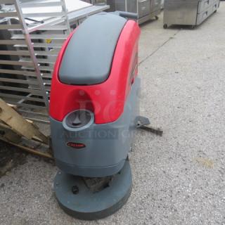 Betco Stealth Carpet Cleaner ASD20B, red and gray, used condition, visible Betco logo, industrial-grade cleaning equipment.
