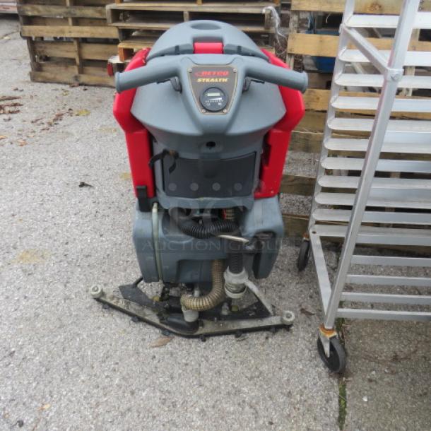 Betco Stealth Carpet Cleaner ASD20B, industrial-grade, gray and red, visible hoses and controls, used condition.