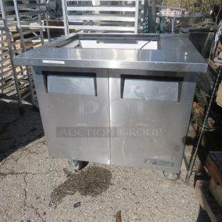 True 2 Door Refrigerated Prep Table, Model TSSU-36-12M-B, stainless steel, no lid, on casters, 36x34x39 inches, 115V.