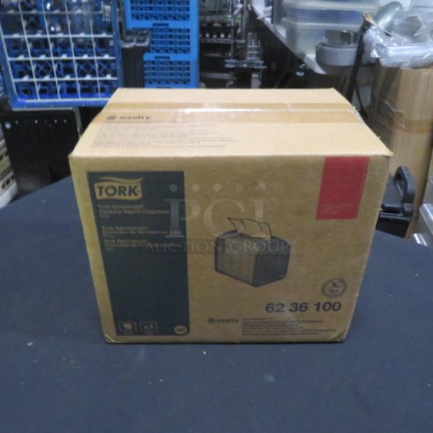 NEW Tork Tabletop Napkin Dispenser, Model 6236100, in original packaging.