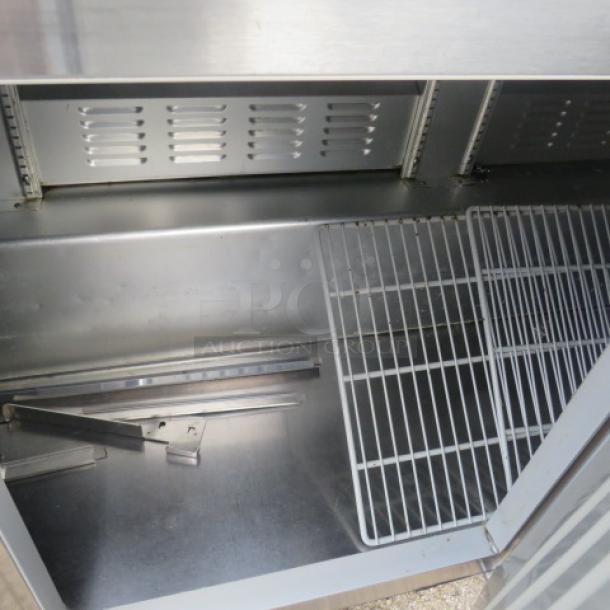 Hoshizaki 3-Door Refrigerated Prep Table, Model CRMR-72-30M, with cutting board, 2 racks, and casters; 72x38x45 inches.