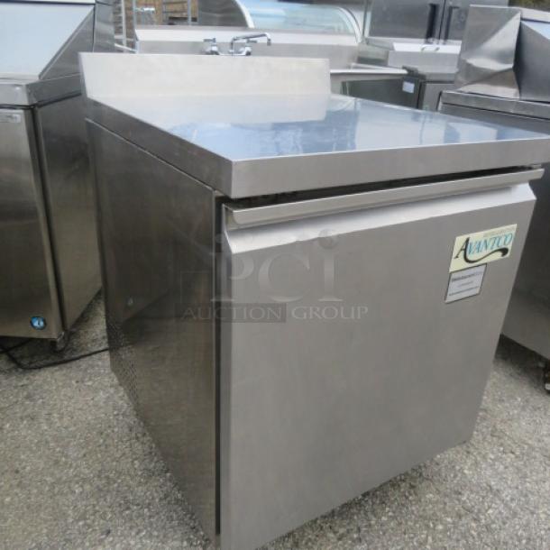 Stainless steel Avantco 178WT27F worktop freezer, one door, 27"x30"x40". Includes one rack, 115 Volt, excellent condition.