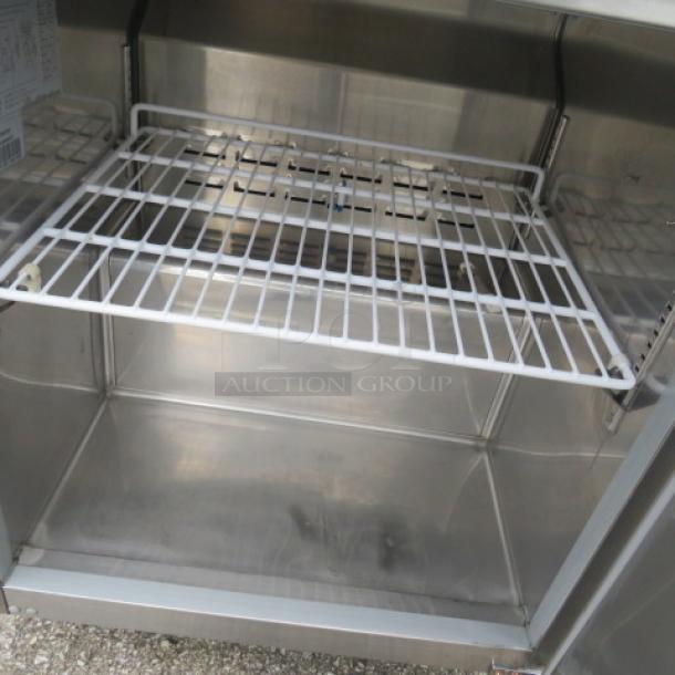 Avantco stainless steel 1-door worktop freezer, model 178WT27F, includes 1 rack. Measures 27x30x40 inches. 115 Volt.