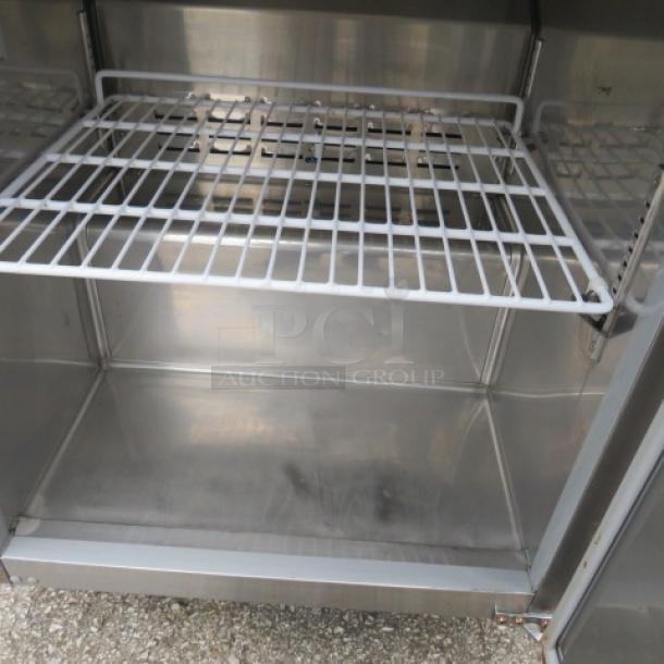 Avantco 178WT27F stainless steel worktop freezer, single door, includes one rack, measures 27x30x40 inches, 115V.