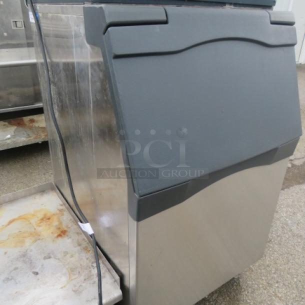 Scotsman Ice Bin, Model B530S, dimensions 30.5x33.5x51 inches. Stainless steel, gray top, gently used. Price: $1415.00.