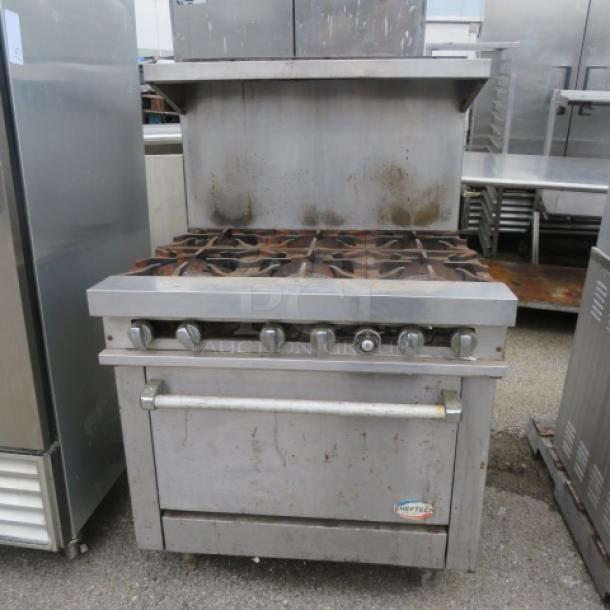 Cheftech natural gas 6 burner range, model R3661, with stainless steel over shelf. Dimensions: 36x33x56 inches. Used condition.