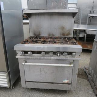 Cheftech natural gas 6 burner range, model R3661, with stainless steel over shelf. Dimensions: 36x33x56 inches. Used condition.